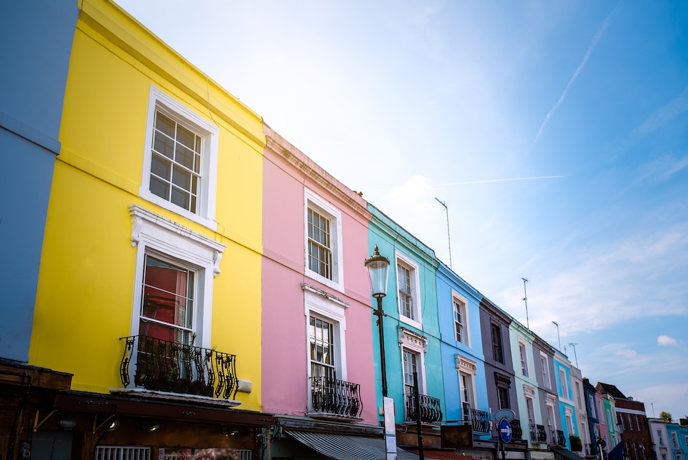 A row of English houses with multicoloured facades